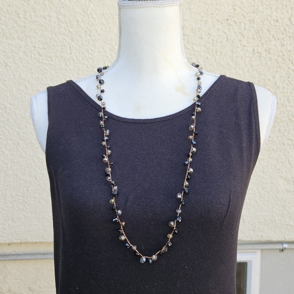 long faceted glass bead necklace black and smoky AB on copper threading